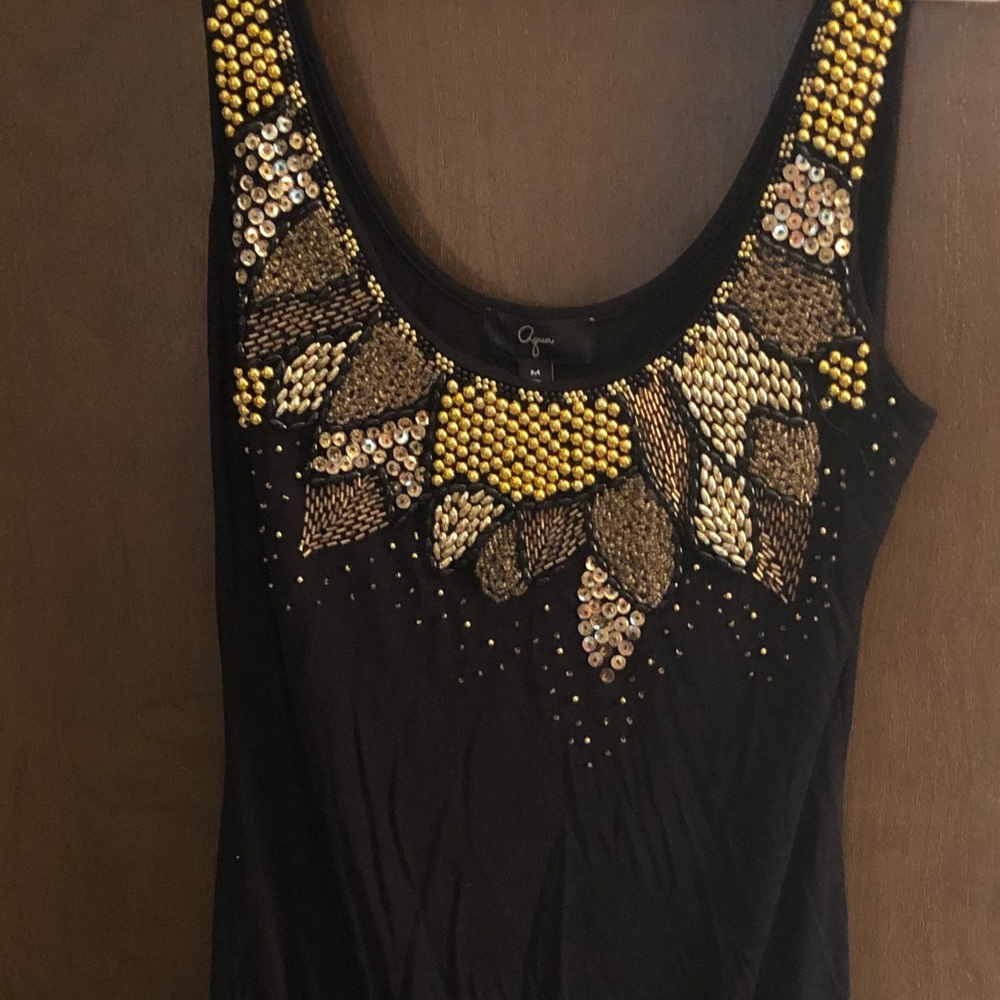 Sleeveless Black dress with gold beading